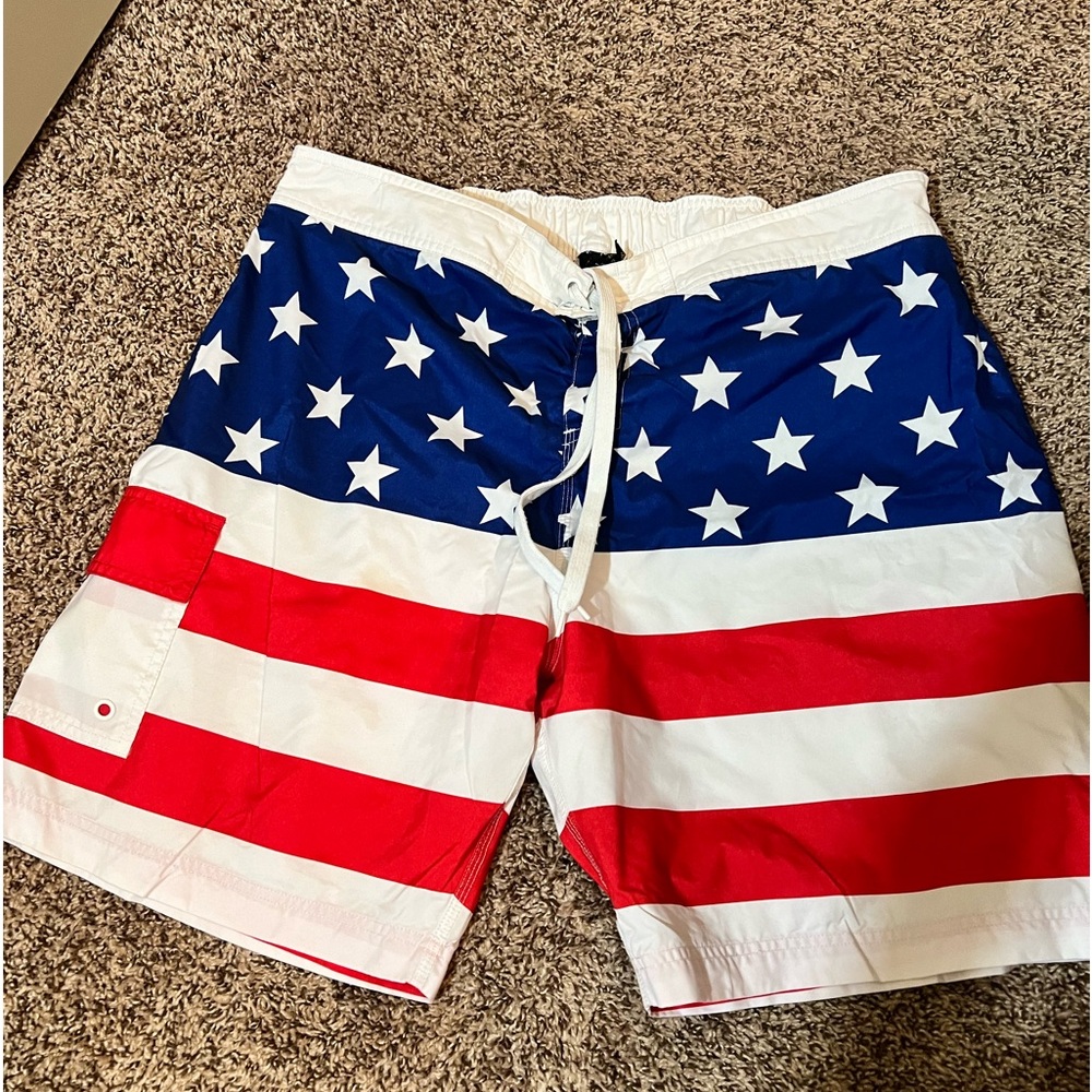 Mens American flag swim trunks.